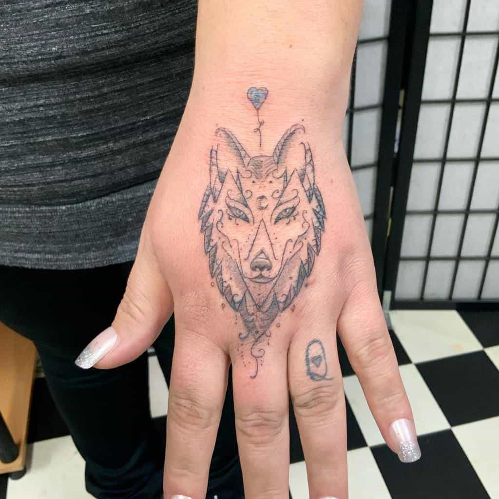 Petit doigt de main de loup Tatouage acid_tattooer